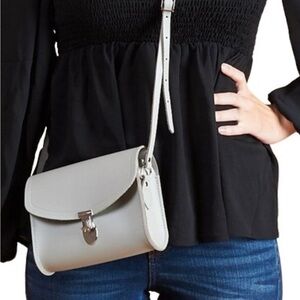 The Cambridge Company Women’s cross-body grey leather bag.
